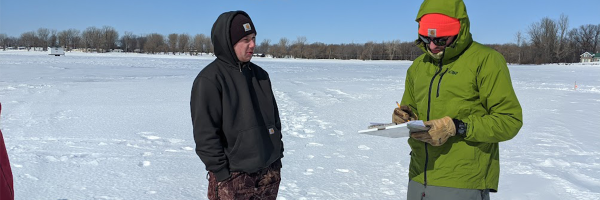 Photo by Mark Malchoff ice fisherman being interviewed on Lake Champlain